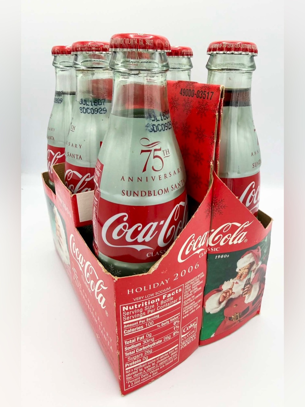 Coca-Cola 8oz Holiday 2006 75th Anniversary Sunblock Santa Full 6 Pack